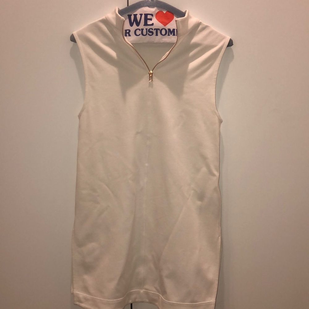 Sleeveless long white top